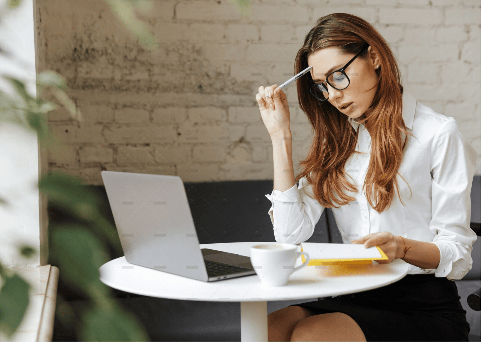 demo-attachment-2051-thoughtful-business-woman-indoors-using-laptop-P5HYUQX@2x-1-min-238